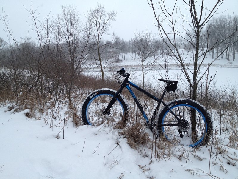 Climbing the bluff overlooking the park pond.  Wintertime riding at its best!