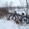 Climbing the bluff overlooking the park pond.  Wintertime riding at its best!