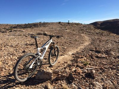 The start of the trail after the hike a bike. Or the end if you're going down. After this point (when riding down, to the right of my bike) its a fairly steep loose descent on the old jeep road. This last section is probably advanced intermediate level when riding down...