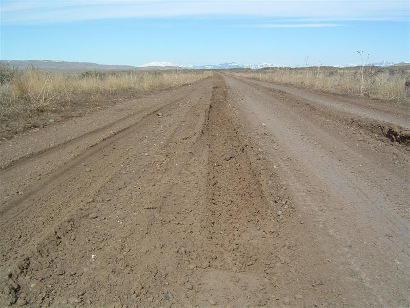 Take care when considering using the roads here. If the skies open up with rain or snow while you are in the area they can become impassable with mud. This is a shot of the road in a dry condition, but the ruts here will give you some idea of what happens when things are more damp.