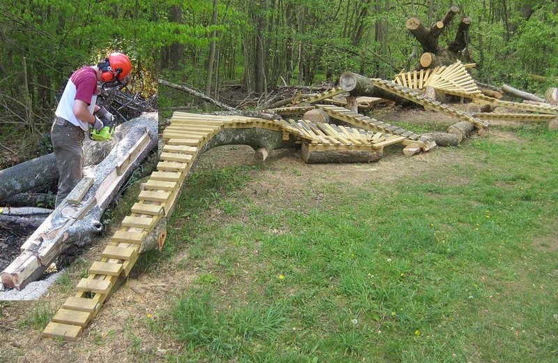 Composite picture of the builder chainsawing the Pitchfork entrance on the left, and the nearly-completed Hellboy stunts on the right.