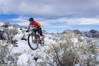 Negotiating a slick corner on Techno after a rare snow in Cottonwood