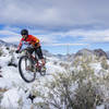 Negotiating a slick corner on Techno after a rare snow in Cottonwood