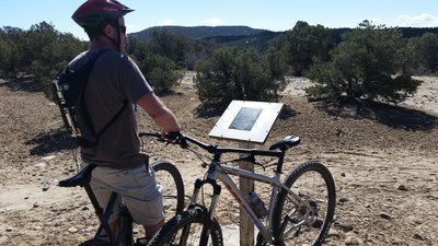 Plaque commemorating the crash site of the supposed UFO that crash landed in 1948. On the Alien Run Trail.