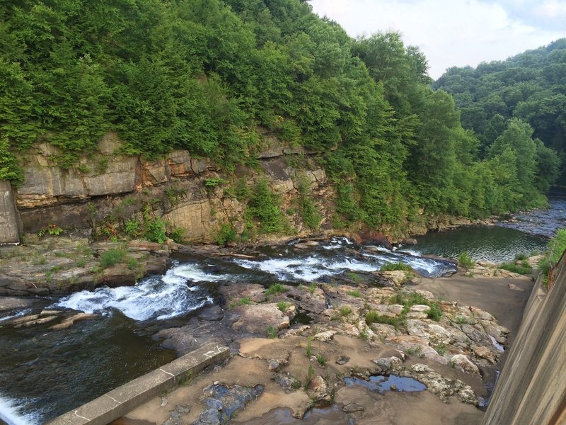 A view of the Spillway from the breast of the dam in the summer.