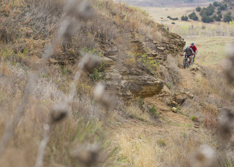 Climbing a scenic section of the Hell Creek Loop.