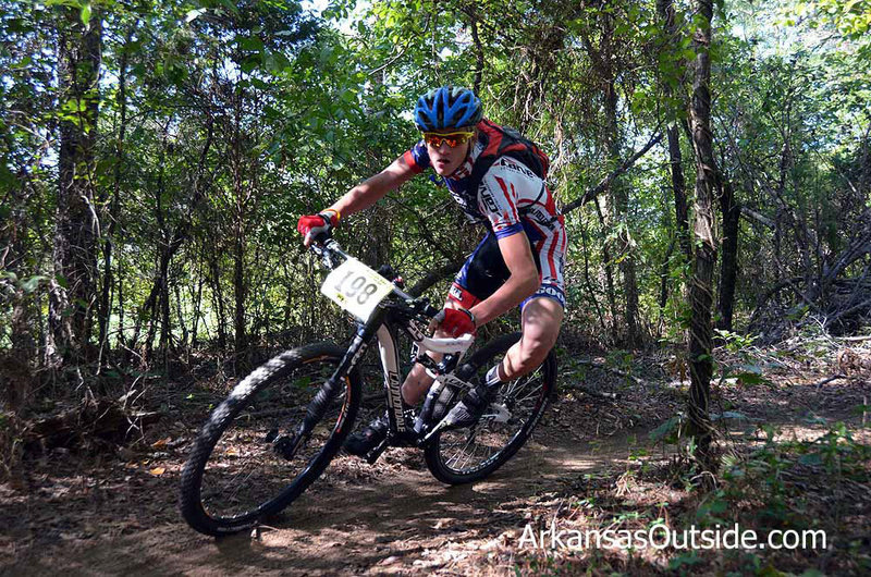 Cat 1 racer taking a turn at speed along the trail.