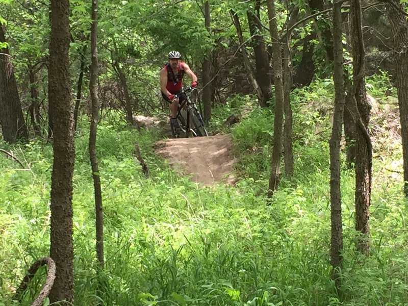 Riding over an obstacle on the West Loop