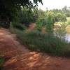 View of pump track around pond