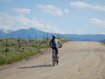 Bikers use the road section here for the Eagle Trail, not the singletrack inside the fence line