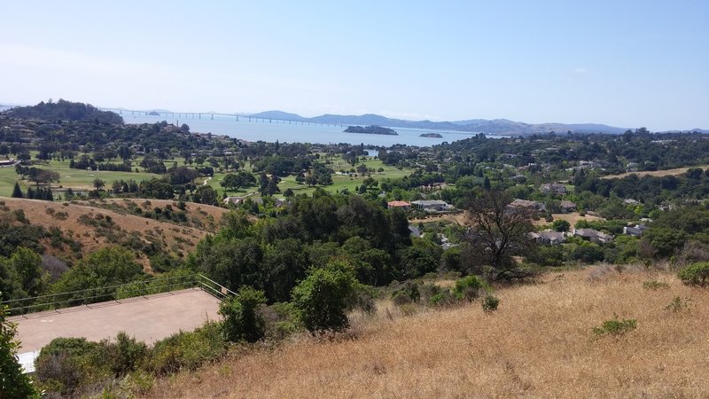 View of SF Bay Richmond Bridge and San Francisco in the distance.