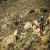 Navigating a boulder section on The Ridge trail.