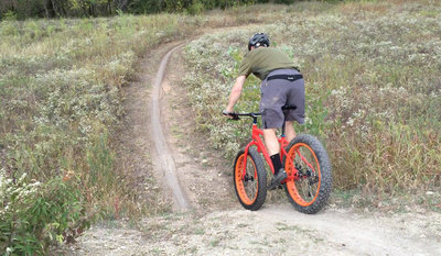 Riding over the big dirt pile...our only elevation!