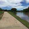 The river is flooded over the path right behind me