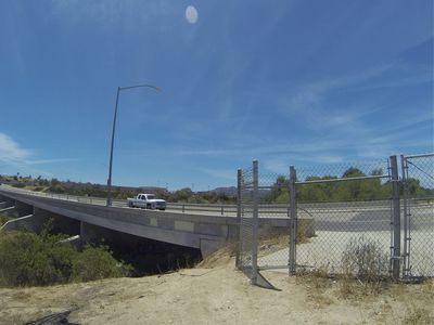Alternate starting location. Can park near the storage place and cross the bridge. Then left onto the park trail.
