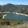 Good view of the other side of the lake and down on a remote boat dock