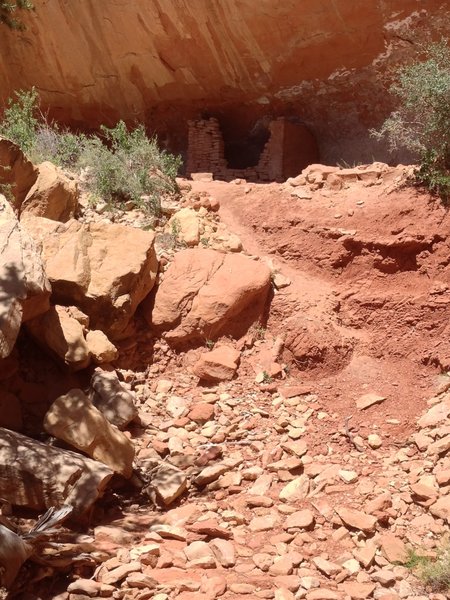 Nice little dwelling tucked away under the cliffs.