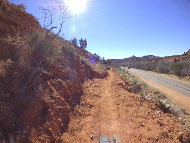 Riding from Water Crossing #1 next to the park road getting ready to climb. Capital Peak in the distance.