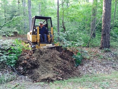 Pushing the final dirt while building Bell Lap - return to the top of Bell Trail