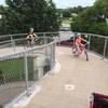 The pedestrian bridge has a spiral on each end that's fun to ride up!