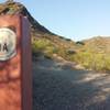 Phoenix has placed new purple signs for Trail 1A.  In doing so, they have completely rerouted the trail in places & bypassed climbs & descents that make 1A both challenging and fun.  Seeing a Trail 1A sign of this style means you are on a part of the original Trail 1A that has since been bypassed.