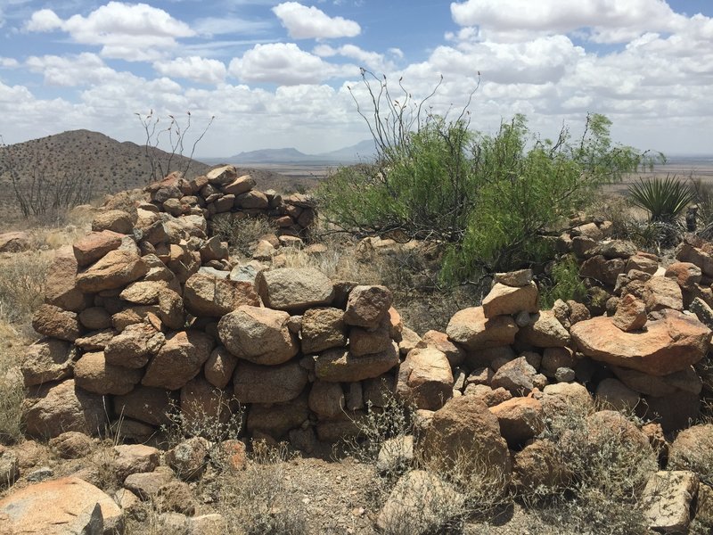 Ruins of an old stone house, likely part of the old mining structures in this area.