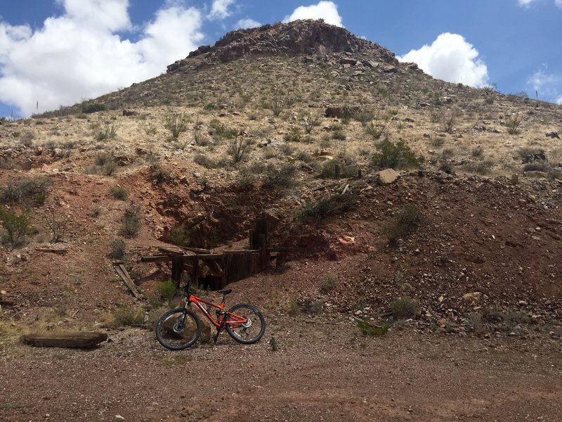 Old wooden mining structure with part of Fluorite Ridge in the background.