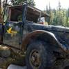 The old Solitude Jeep sitting by the mechanics shop.