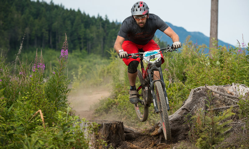 Clearing a stump on Brazilian during the Cascadia National Enduro Championship.
