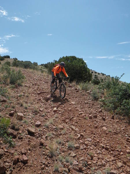 The descent from the summit is fun, fast and loose. Watch for the sharp transition at the bottom as the trail is washed out.