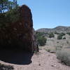 Unbeatable boulder - Lots of great lines for climbers! Trail visible on the right.