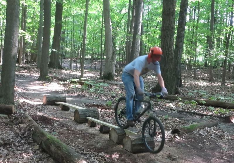 The builder riding Whiplash, a stunt on Hansen's Be-Bop. This is a good practice line for stunts further along in your ride. 2"x10" entry, drop to long 2"x6", drop to long 2"x4", then onto short on-end 2"x4". Yes, 2" wide at the end! This is a beginner/intermediate stunt with little risk involved