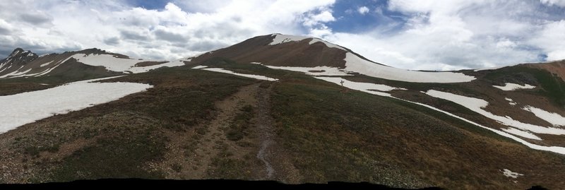 Bear Creek Trail sign in front of the snowfield, turn RIGHT here, head up and right around the corniced snowfield.