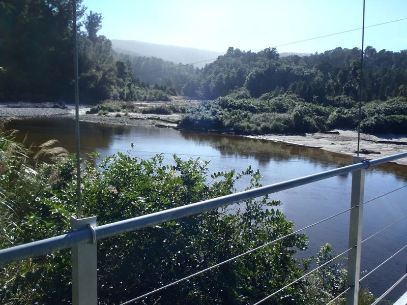 View up the Lewis River from the Heaphy River susupension bridge