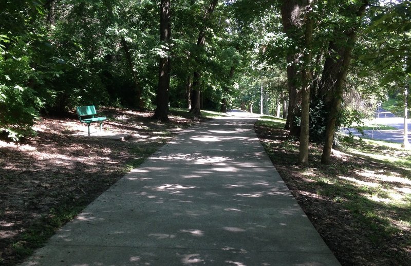 This is where the Corby North Trail starts.  No signs or markers. The trailhead is behind this green bench.