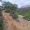 Trail runs along a cliff