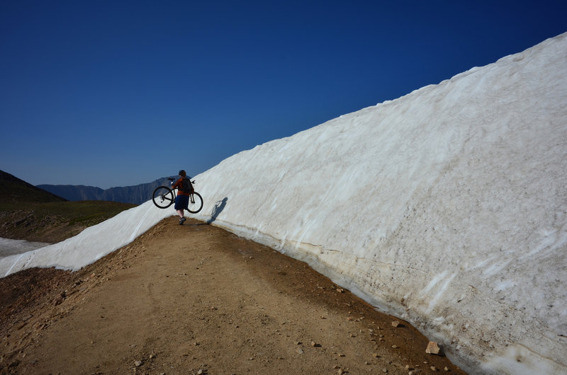 End of the Jones Pass road (till it melts). Time to get up and over creatively.