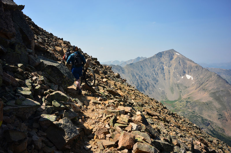 First section of tech-y hike and/or carry and/or push a bike, a short one.