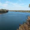 The view upriver from South Bluff Overlook. At this point you can watch the Sacramento State Aquatic Center practices and competitions as the starting line is usually right below this spot.