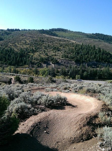 Snaking downhill on deliciously formed and bermed trail