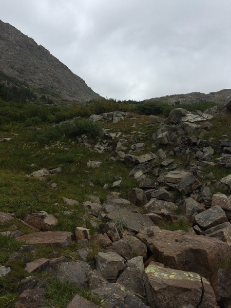 Many a rocks to cross and cairns to mark your path