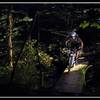 Crossing a bridge on the Frontier Loop Trail in Kris-Mar Woods.