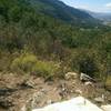 This tiny rock bench just off the trail offers a pleasant view