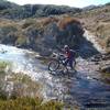 Crossing the headwaters of Big River, Gouland Downs. Much faster than the swingbridge if the river is low.