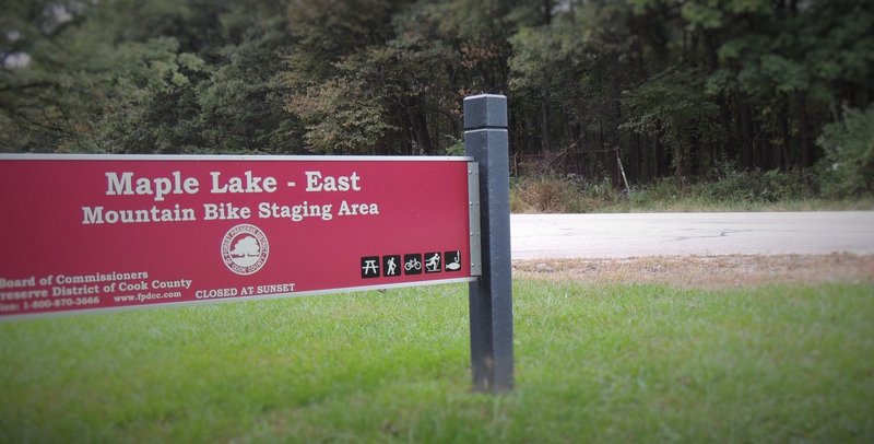 The Mountain Bike Staging Area for the Palos trail system is at the Maple Lake East picnic grove parking lot on 95th St., just west of Flavin/Willow Springs Rd.  The entrance to the Cemetery Hill Connector is across the street from the parking lot.