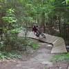 Johnny shows off his good form on one of the wooden berms.