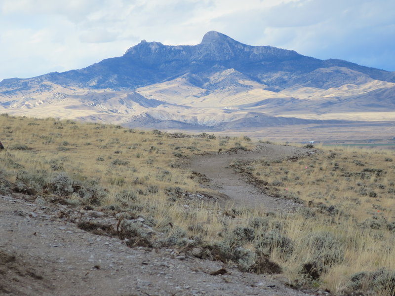 Heart mountain, your northern arrow, looms on the horizon as you look back down from where you just climbed.