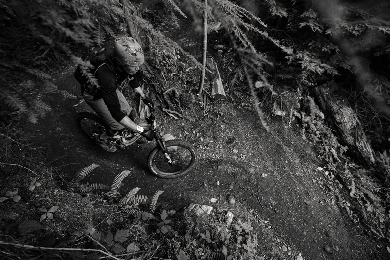 Michael Thompson berms through an abrupt chicane on lower Joy Ride.