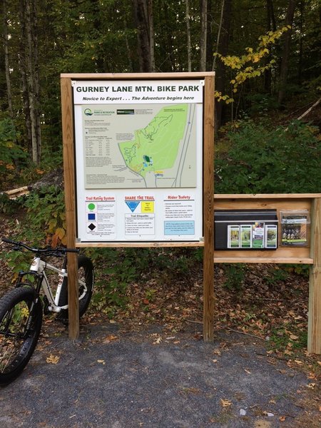 Trail map sign near entrance at Gurney. Brochures and trail maps of other local parks are also available here.