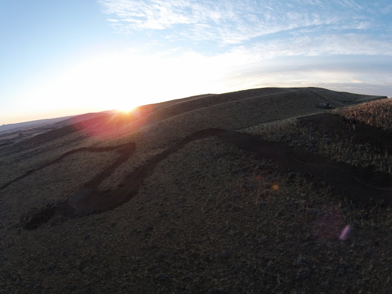 The trail is meticulously carved into wide open, perfectly angled ridgeline.